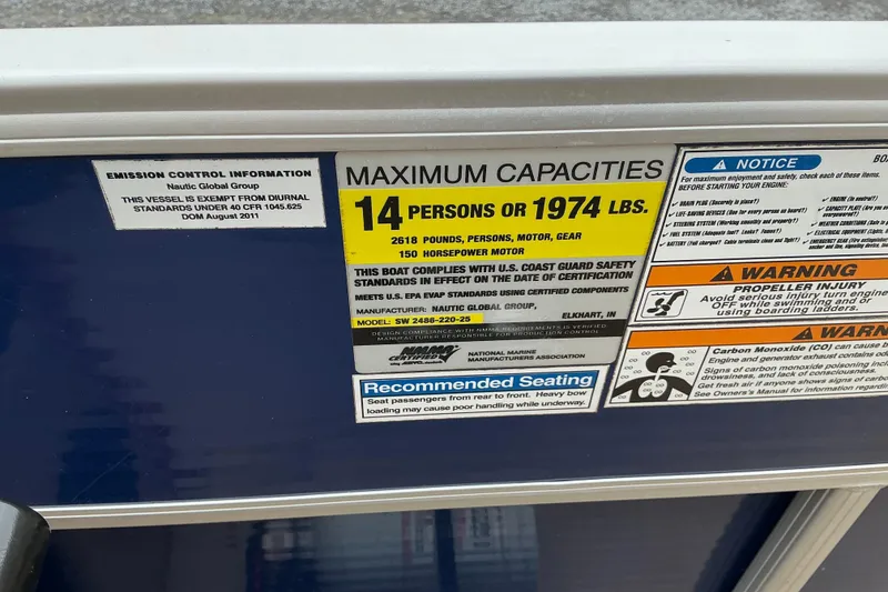 Slide: The Image of 2012 Godfrey Sweetwater 2486 C capacity label: 14 persons or 1974 lbs, 150 HP motor. - 6