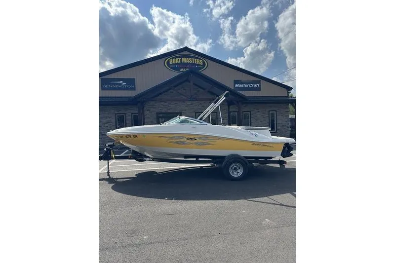 Slide: The Image of 2008 Sea Ray 185 Bow Rider boat on trailer outside Boat Masters shop. - 11