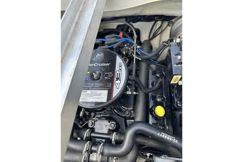 Slide: The Image of Engine of 2008 Sea Ray 185 Bow Rider boat, featuring MerCruiser 4.3L V6. - 2