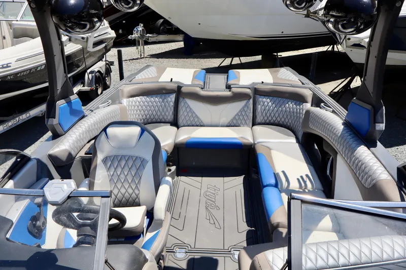 Slide: The Image of 2017 Tigé Z3 boat interior with luxurious seating and modern design. - 4