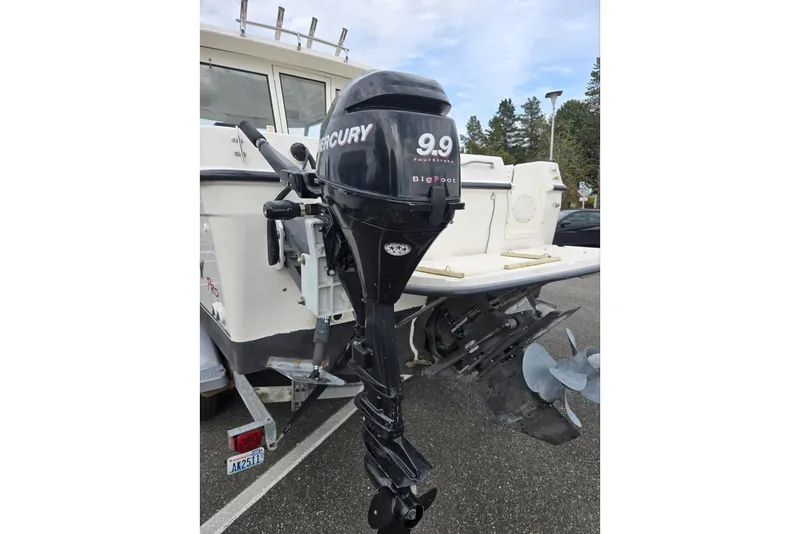 Slide: The Image of Mercury 9.9 FourStroke outboard motor on 2006 Trophy 2359 Pro boat. - 12