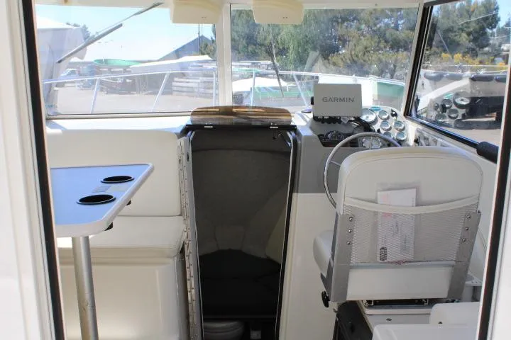 Slide: The Image of Interior of a 2006 Trophy 2359 Pro boat with Garmin navigation system. - 23