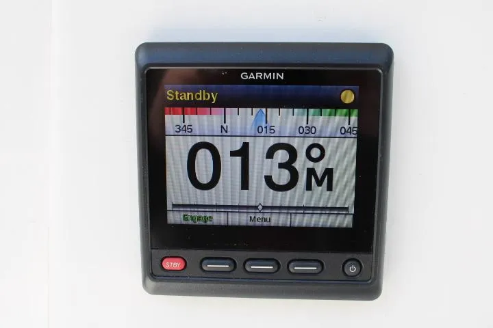 Slide: The Image of Garmin marine navigation display on 2006 Trophy 2359 Pro boat, showing compass heading. - 26