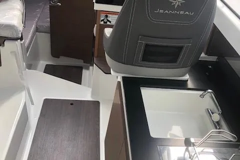 Slide: The Image of Interior of 2022 Jeanneau NC 795 featuring seat and sink. - 3