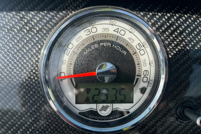 Slide: The Image of Speedometer of 2016 Four Winns TS222 boat, displaying 23.35 miles per hour. - 19
