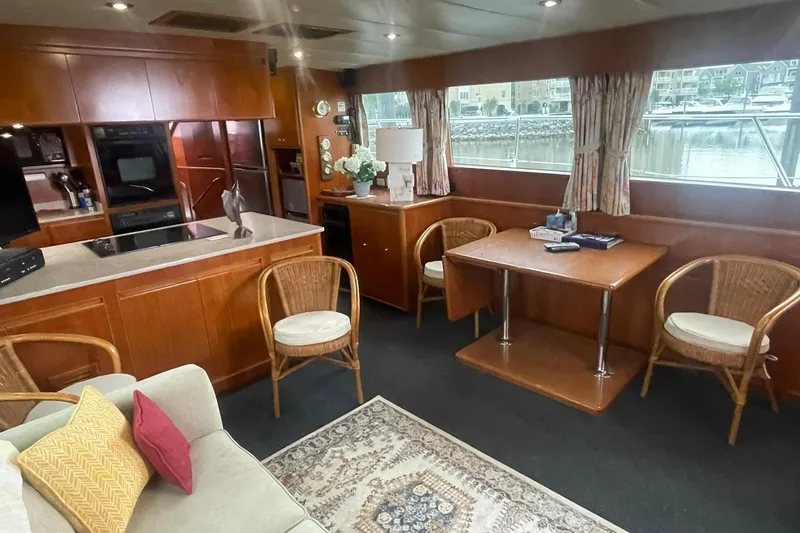 Slide: The Image of Luxurious 2001 Novatec Islander yacht interior with elegant wood finishes and comfortable seating. - 21