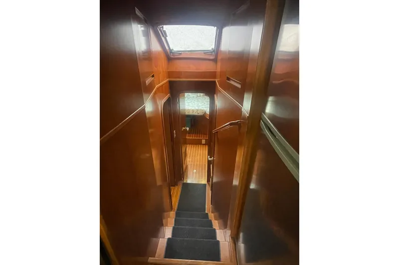 Slide: The Image of Interior staircase of 2001 Novatec Islander yacht with wooden finish. - 29