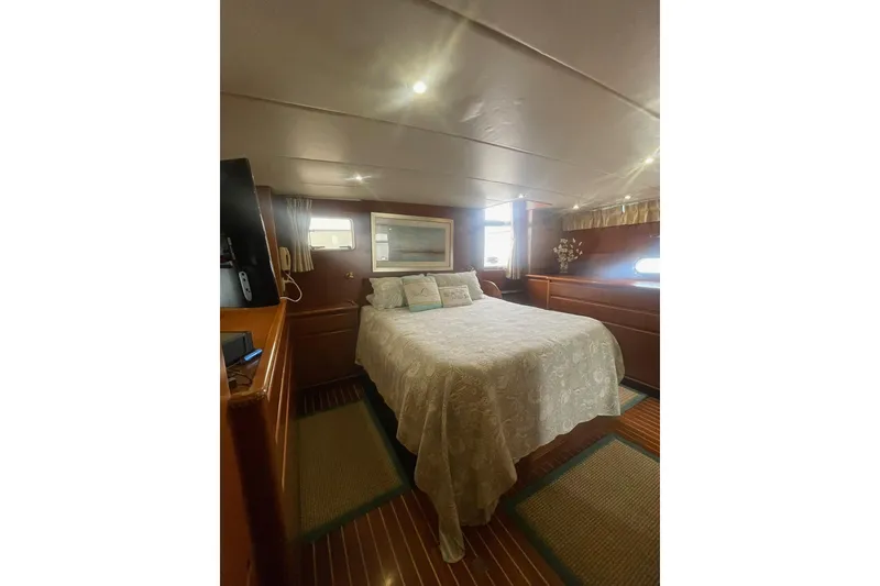 Slide: The Image of Luxurious bedroom interior of 2001 Novatec Islander yacht with elegant decor and cozy ambiance. - 37