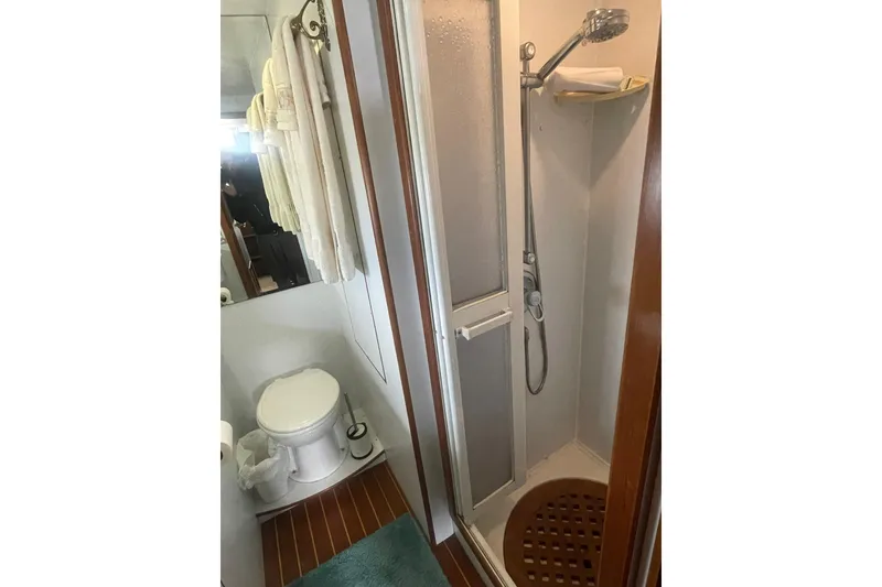 Slide: The Image of Bathroom interior of 2001 Novatec Islander yacht with shower and toilet. - 42