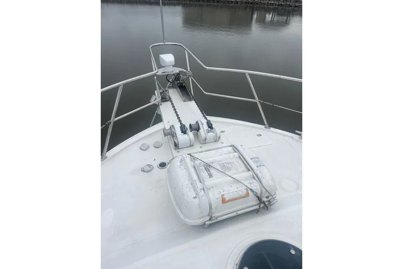 Slide: The Image of Bow of 2001 Novatec Islander yacht with anchor chain and life raft. - 53