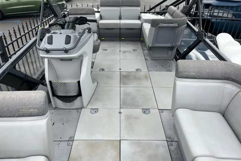 Slide: The Image of 2022 Sea-Doo Switch Cruise 21 interior with spacious seating and modern helm controls. - 4
