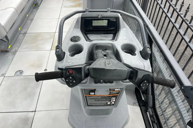 Slide: The Image of 2022 Sea-Doo Switch Cruise 21 steering console with controls and display. - 5