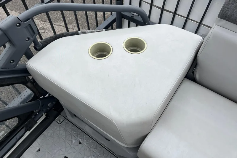 Slide: The Image of 2022 Sea-Doo Switch Cruise 21 seating area with integrated cup holders. - 6