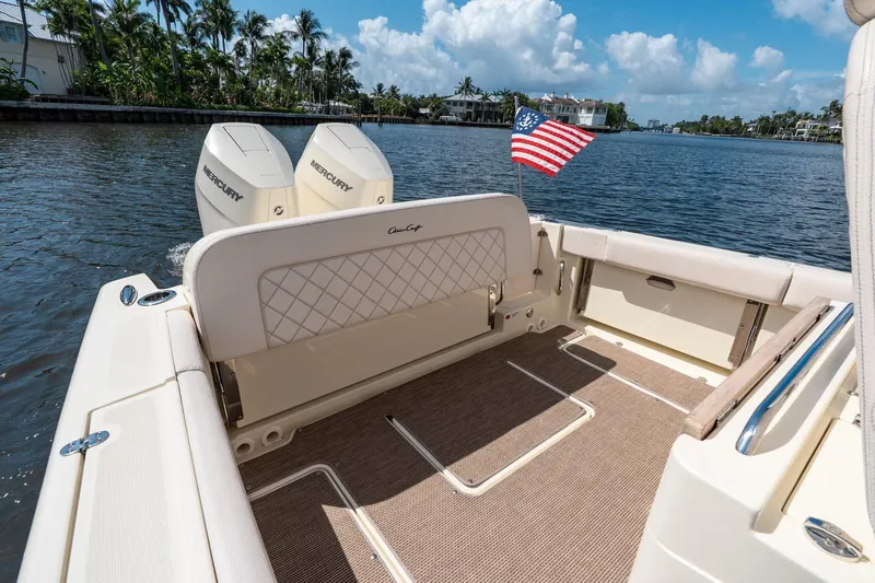 Slide: The Image of 2024 Chris-Craft Catalina 30 boat with Mercury engines on a sunny waterway. - 29