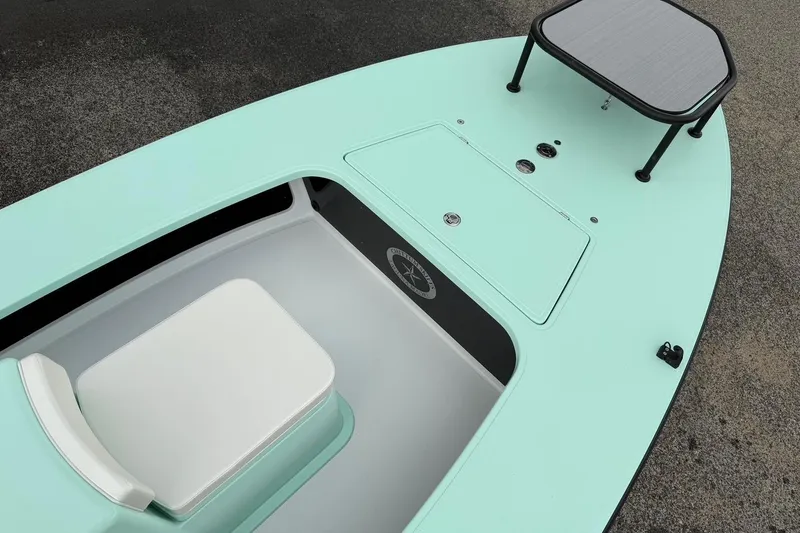 Slide: The Image of 2026 Chittum Skiffs 18 Laguna Madre Carbon boat deck with seating and storage. - 11