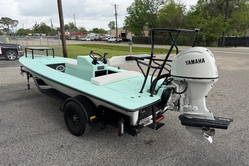 Slide: The Image of 2026 Chittum Skiffs 18 Laguna Madre Carbon with Yamaha engine on trailer. - 2