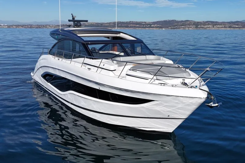 The Image of Luxury 2026 Princess V55 yacht on calm blue waters, showcasing sleek design and elegance. - 0