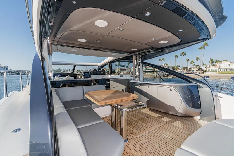 Slide: The Image of Luxurious 2026 Princess V55 yacht interior with sleek design and waterfront view. - 18