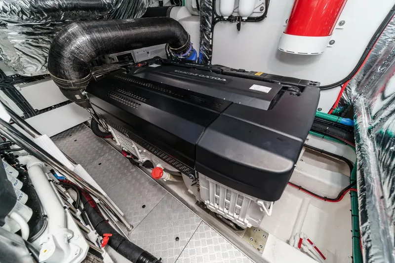Slide: The Image of Engine room of 2026 Princess V55 yacht, featuring advanced machinery and sleek design. - 60