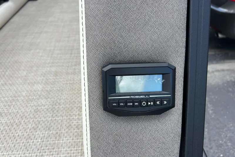 Slide: The Image of Control panel on Alera M23L 2026 model, featuring Roswell audio system. - 12