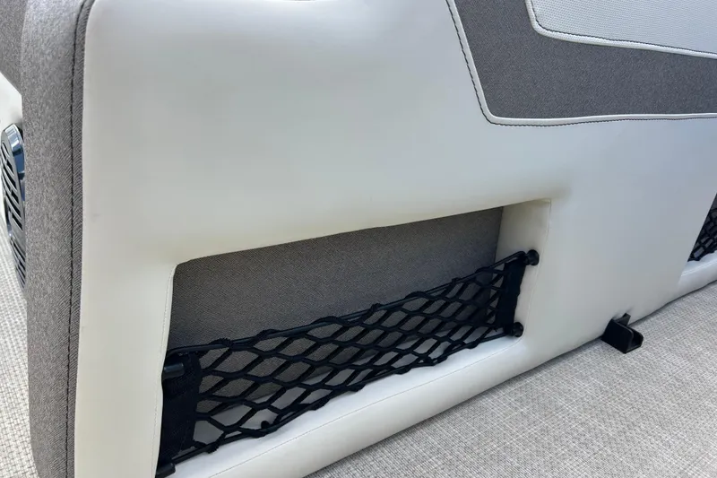 Slide: The Image of Alera M23L 2026 boat seat with storage net and speaker detail. - 14
