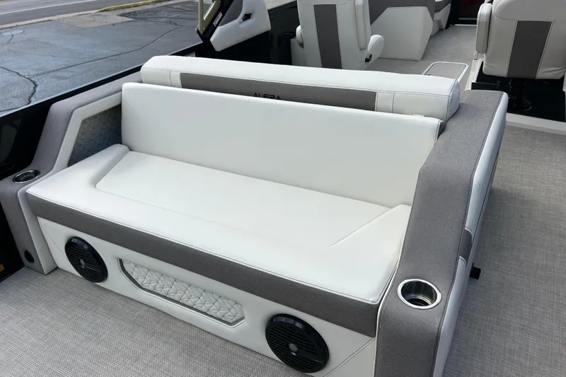 Slide: The Image of Luxurious seating in 2026 Alera M23L boat with integrated speakers and cup holders. - 15