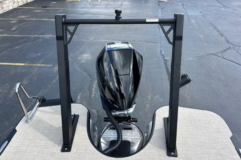Slide: The Image of Alera M23L 2026 boat motor on a docked platform, showcasing sleek design. - 18
