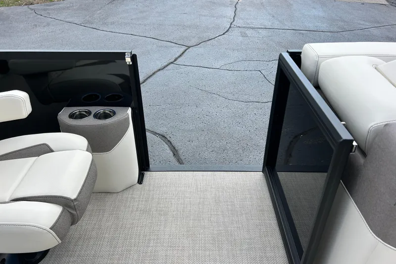 Slide: The Image of Interior of 2026 Alera M23L boat with seating and cup holders. - 39