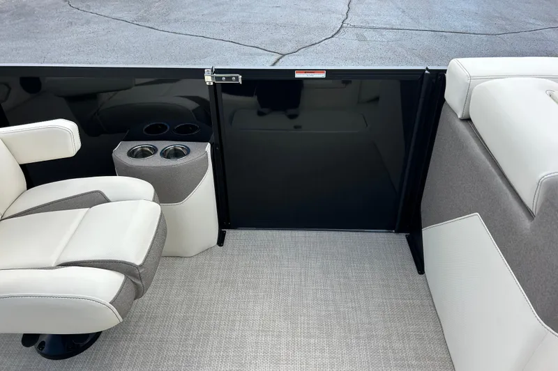 Slide: The Image of Interior of 2026 Alera M23L boat with seating and cup holders. - 40