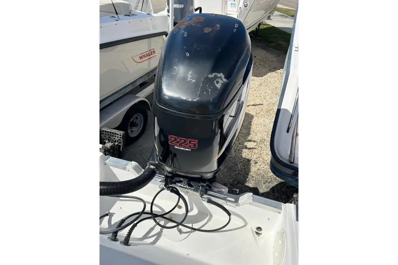 Slide: The Image of Outboard motor on 2005 Aquasport 250 Explorer boat, Suzuki 225 engine. - 17