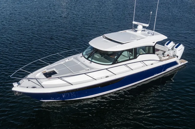 The Image of 2026 Tiara Yachts 43LE luxury boat on calm water, showcasing sleek design and modern features. - 1