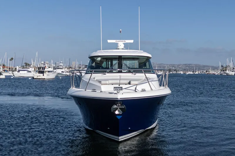 Slide: The Image of 2026 Tiara Yachts 43LE luxury yacht on calm waters, front view. - 10