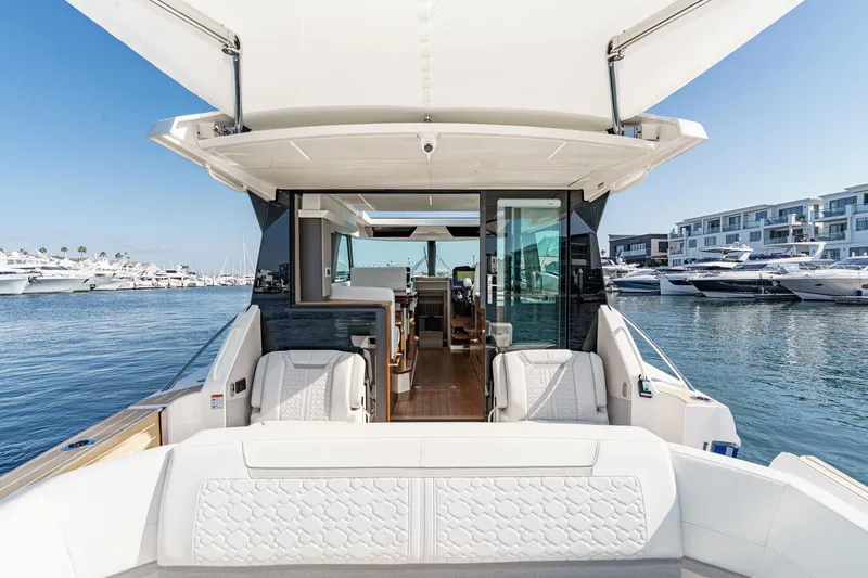 Slide: The Image of 2026 Tiara Yachts 43LE luxury yacht interior with marina view. - 21