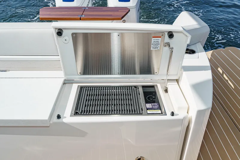 Slide: The Image of Outdoor grill on 2026 Tiara Yachts 43LE, featuring sleek design and modern amenities. - 25