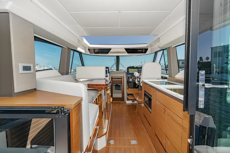 Slide: The Image of Luxurious interior of 2026 Tiara Yachts 43LE, featuring modern design and elegant wood finishes. - 32