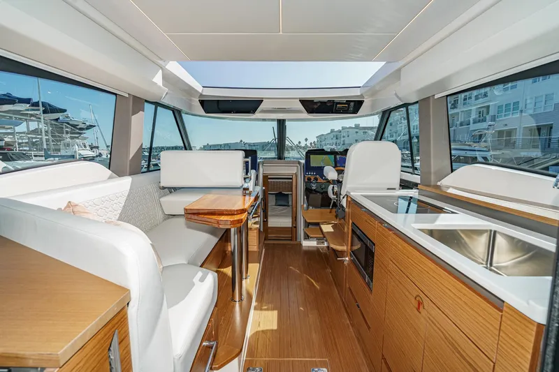 Slide: The Image of Luxurious interior of 2026 Tiara Yachts 43LE, featuring modern design and spacious seating. - 33