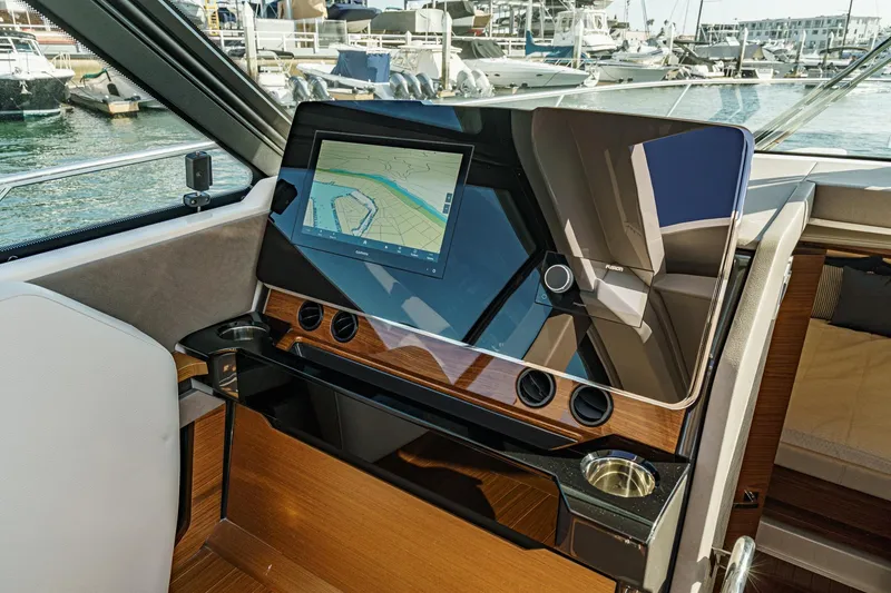 Slide: The Image of Interior of 2026 Tiara Yachts 43LE with advanced navigation system and luxurious design. - 42