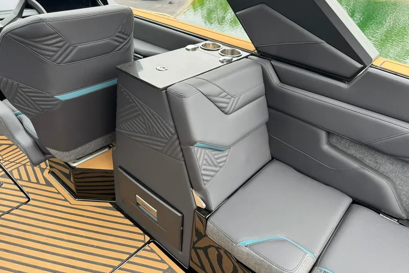 Slide: The Image of Luxurious interior of 2025 MasterCraft XStar 25 boat with sleek gray seating. - 16