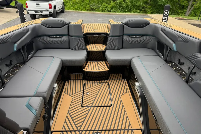Slide: The Image of Luxurious interior of 2025 MasterCraft XStar 25 boat with stylish seating and modern design. - 23