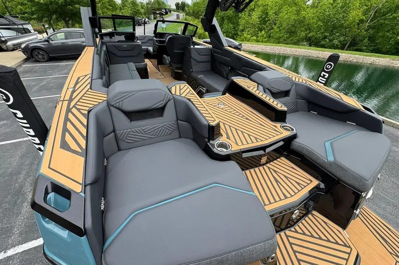 Slide: The Image of 2025 MasterCraft XStar 25 boat interior with luxurious seating and modern design. - 30
