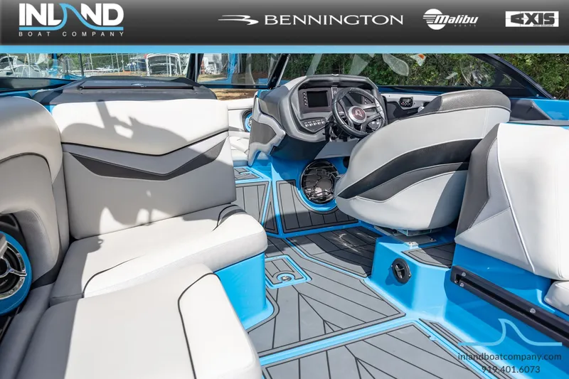 Slide: The Image of Interior of a 2016 Centurion Ri237 boat with blue accents. - 15