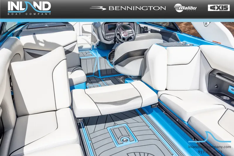 Slide: The Image of Interior of a 2016 Centurion Ri237 boat with luxurious white seating. - 16