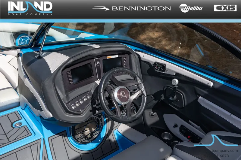 Slide: The Image of Interior of a 2016 Centurion Ri237 boat with modern helm console. - 17