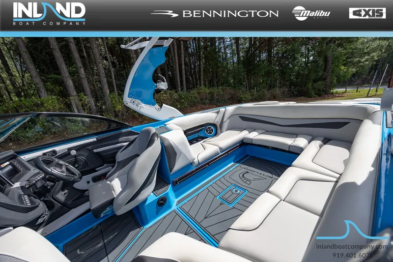 Slide: The Image of Interior of a 2016 Centurion Ri237 boat with blue accents. - 27