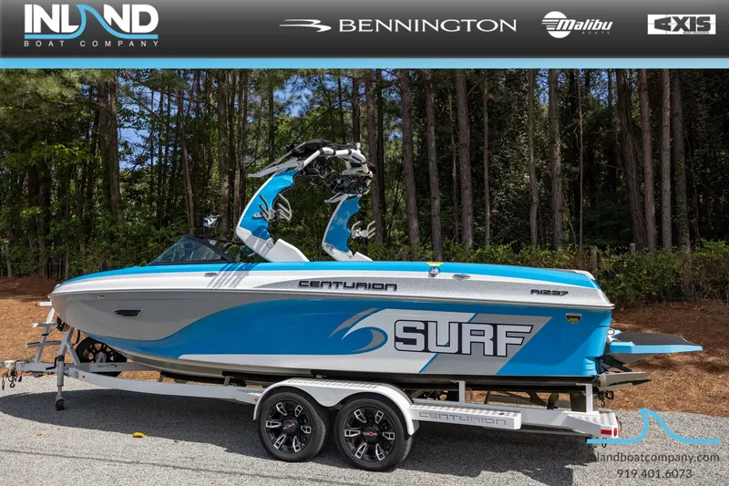 Slide: The Image of 2016 Centurion Ri237 surf boat on trailer outdoors. - 4