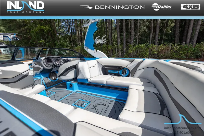 Slide: The Image of Interior of a 2016 Centurion Ri237 boat, luxurious design, blue and white upholstery. - 5