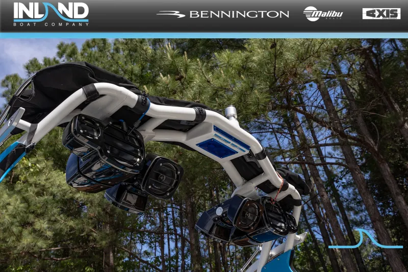 Slide: The Image of Centurion Ri237 2016 boat with speakers and trees in the background. - 7