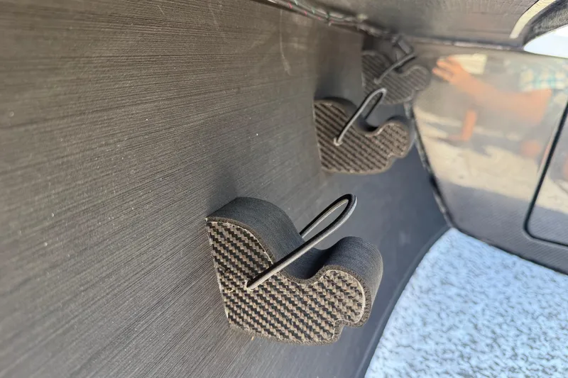 Slide: The Image of Close-up of carbon fiber components in a 2026 Chittum Skiffs 18 Challenger 2.0 Tunnel boat. - 11