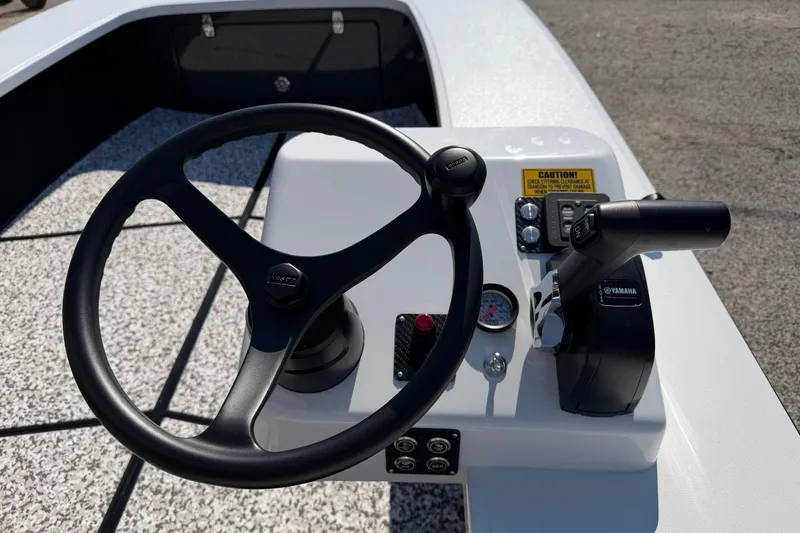 Slide: The Image of Steering console of 2026 Chittum Skiffs 18 Challenger 2.0 Tunnel boat with Yamaha controls. - 13