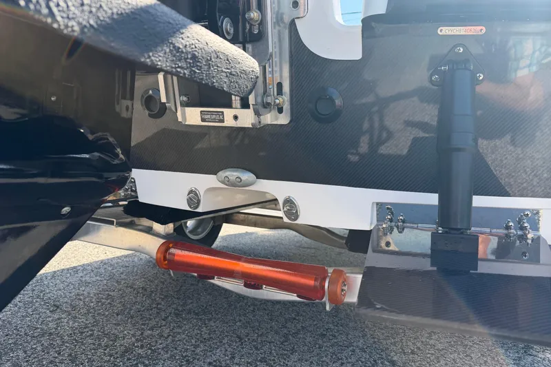 Slide: The Image of Close-up of 2026 Chittum Skiffs 18 Challenger 2.0 Tunnel boat's transom and hardware. - 19